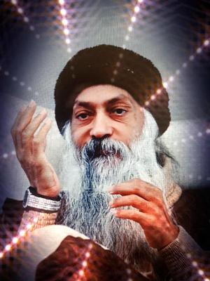 Bhagwan holds up his right hand and looks away from the camera. He has a long, white beard, a black cap, and on his right wrist is a diamond-studded Rolex.